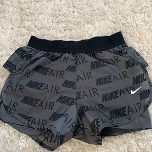Black and Grey nike air shorts.